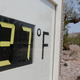 A 2013 photo shows the Furnace Creek Visitor Center thermometer. It reached 127 degrees Fahrenheit four times in July 2018.